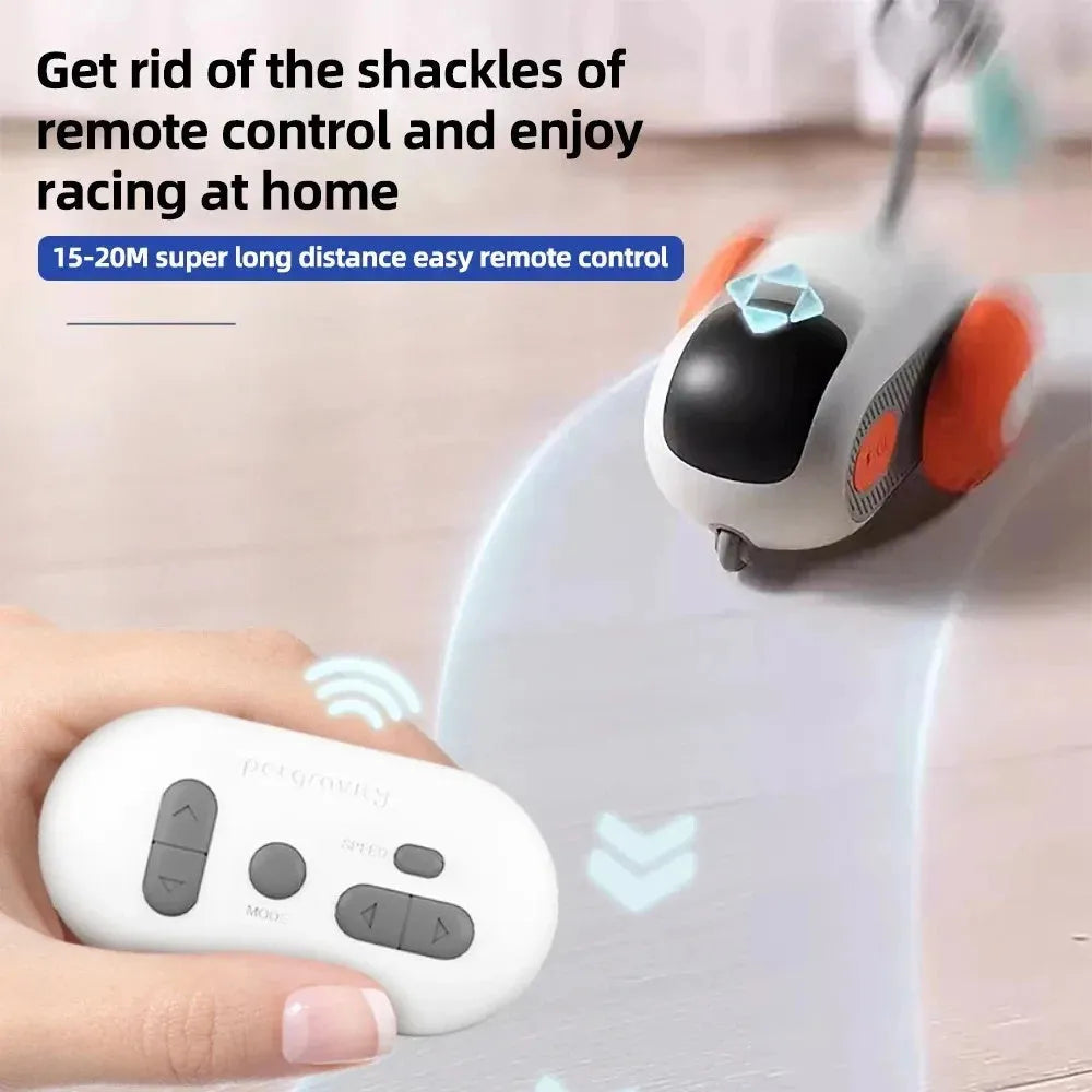 Blue remote controlled cat toy car with feather teaser attachment on hard floor