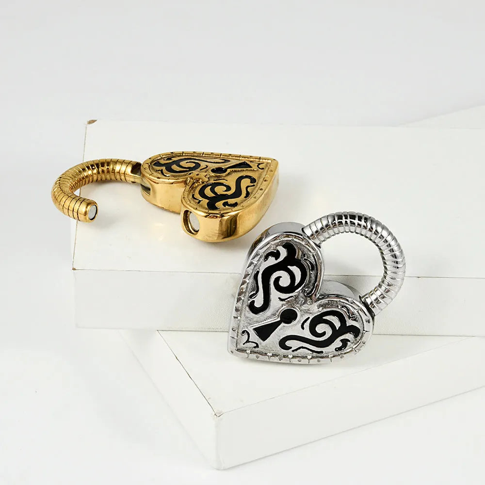 Heart-shaped stainless steel stud earrings with electroplated gold colour finish