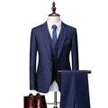 Men's navy blue plaid slim fit three-piece suit with vest, jacket, and trousers on a hanger.