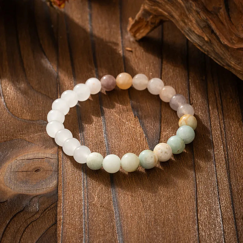 Retro style long beaded necklace and matching bracelet set in geometric round beads.