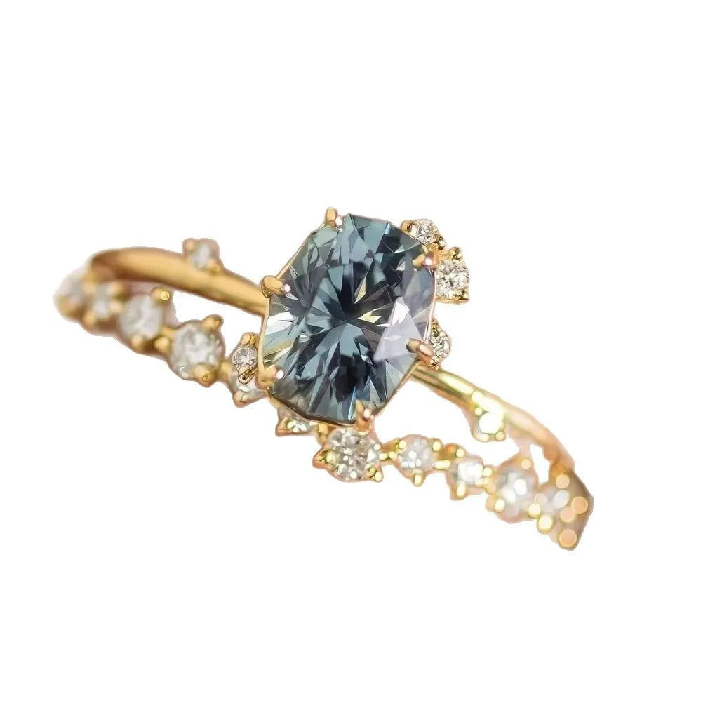 Gold plated flower shaped ring with green zircon stone in women's sizes UK 6 to 10