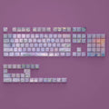 Wenshao Sleeping Lotus PBT keycap set with 130 keys, showing side-engraved legends and five-sided dye-sublimated artwork.