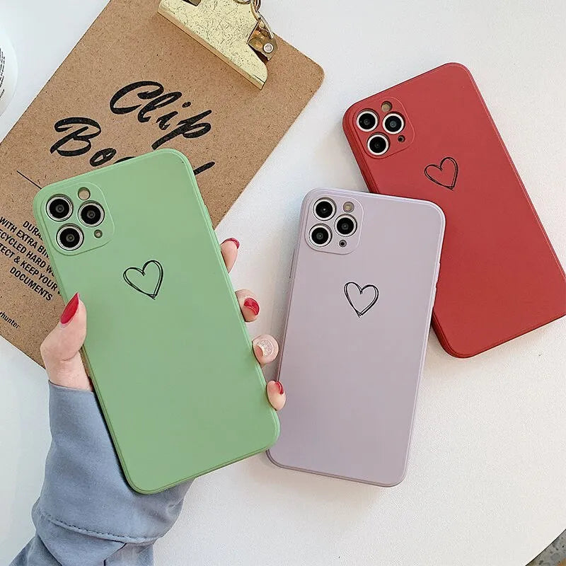 A selection of solid-colour TPU silicone back cover cases for various Apple iPhone models.