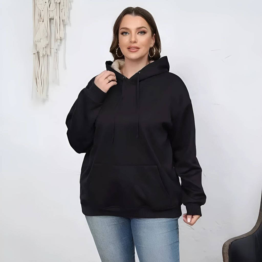Women's loose fit hooded sweater in thick grey polyester fleece with a 3D pattern and front pockets.