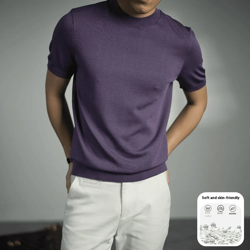 Man wearing a solid colour knitted t-shirt with round neck and short sleeves, showcasing business casual style.
