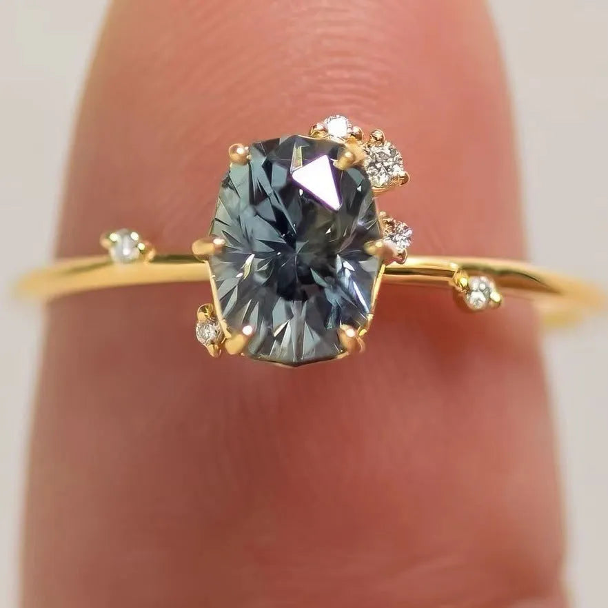 Gold plated flower shaped ring with green zircon stone in women's sizes UK 6 to 10