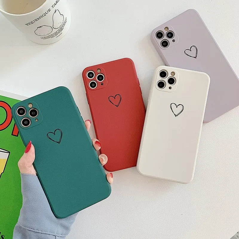 A selection of solid-colour TPU silicone back cover cases for various Apple iPhone models.