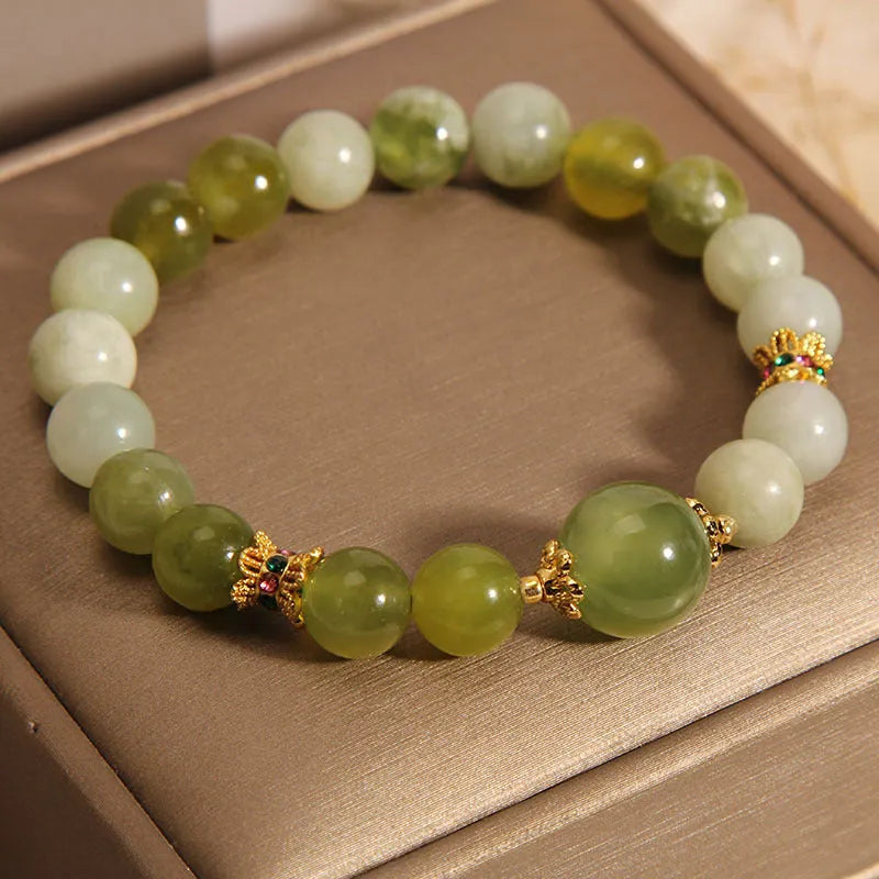 Women's bracelet made from green Xiuyan jade in a light luxury sweet Mori style.