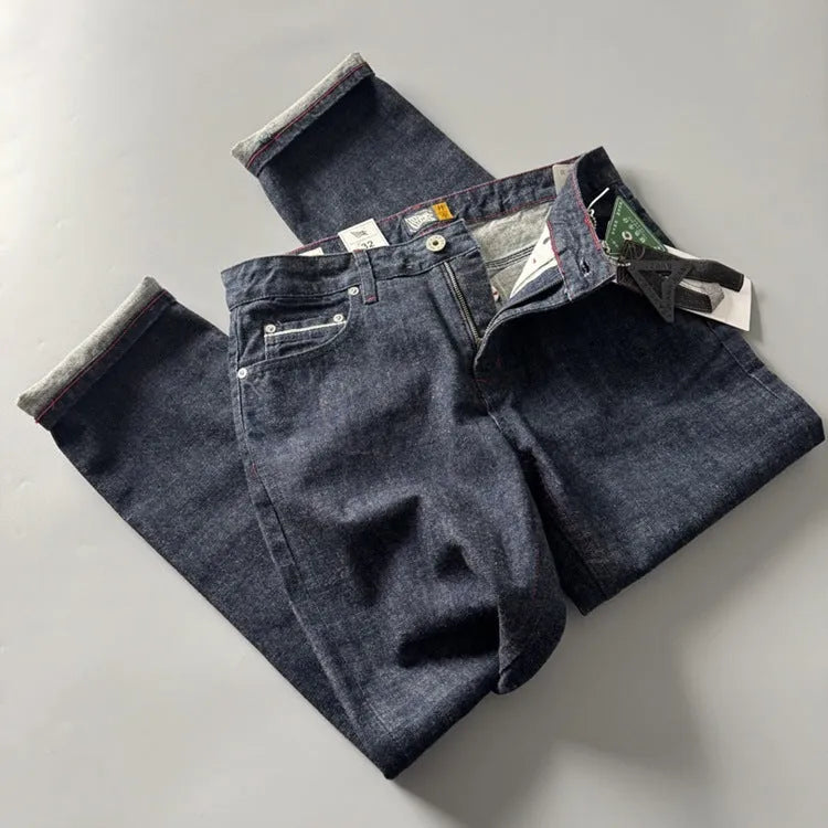Men's primary colour straight leg denim trousers on a mid-waist fit model.