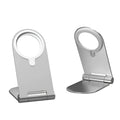 Silver vertical adjustable portable magnetic phone bracket on a metallic surface