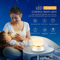 White bedside night light with touch controls for dimming and colour changing