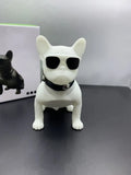 Mini bulldog-shaped Bluetooth speaker in black, red, or white colours showing wireless design
