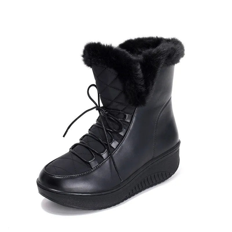 Black women's lace-up winter boots with a platform sole on a white background