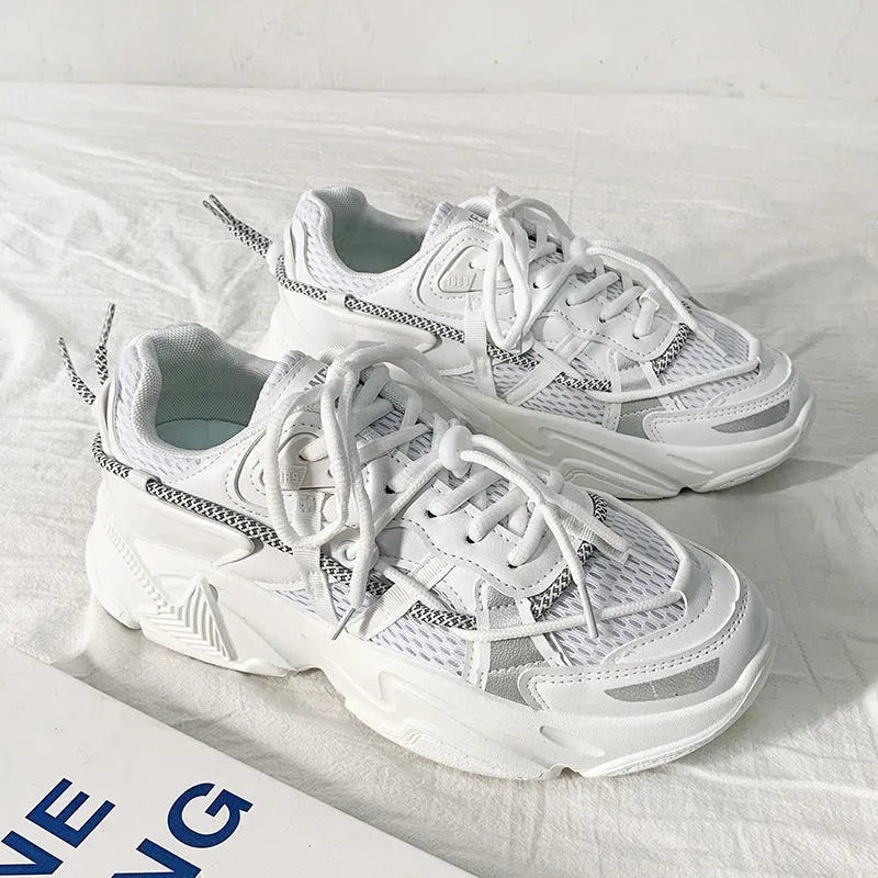 Men's Korean style platform dad sneakers in black, white, and grey colours with front lace-up closure