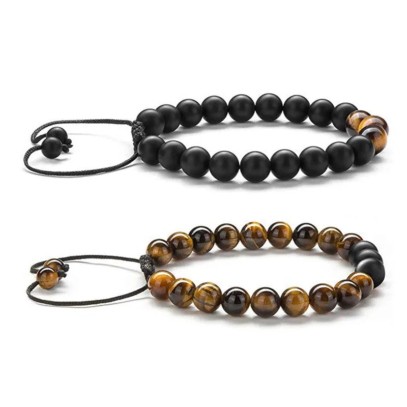 Matte black agate couple bracelets with geometric beads on wrist