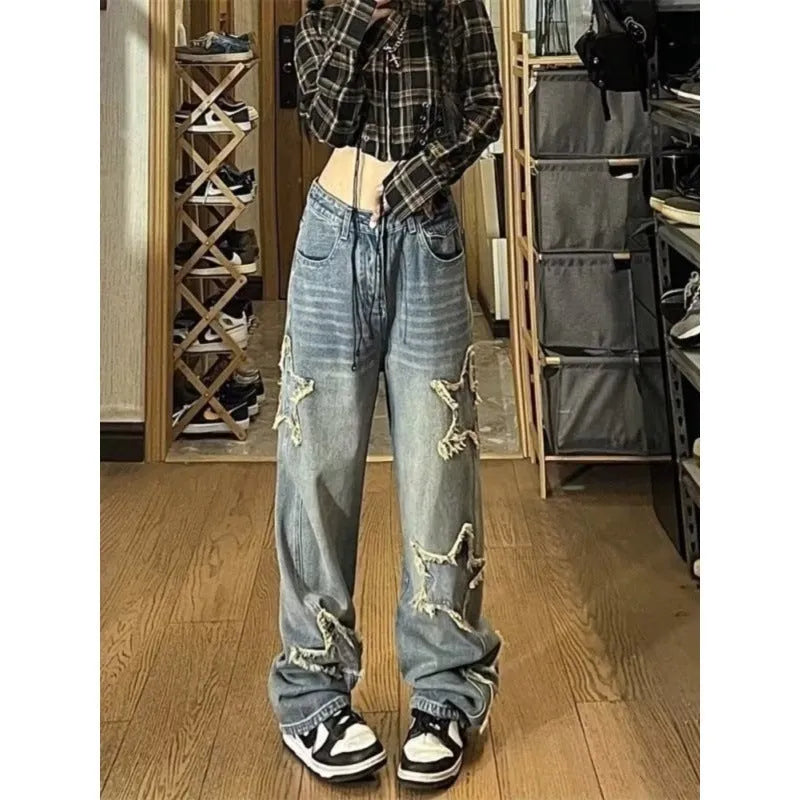 Blue cotton denim wide-leg high waist pants laid flat showing straight leg cut