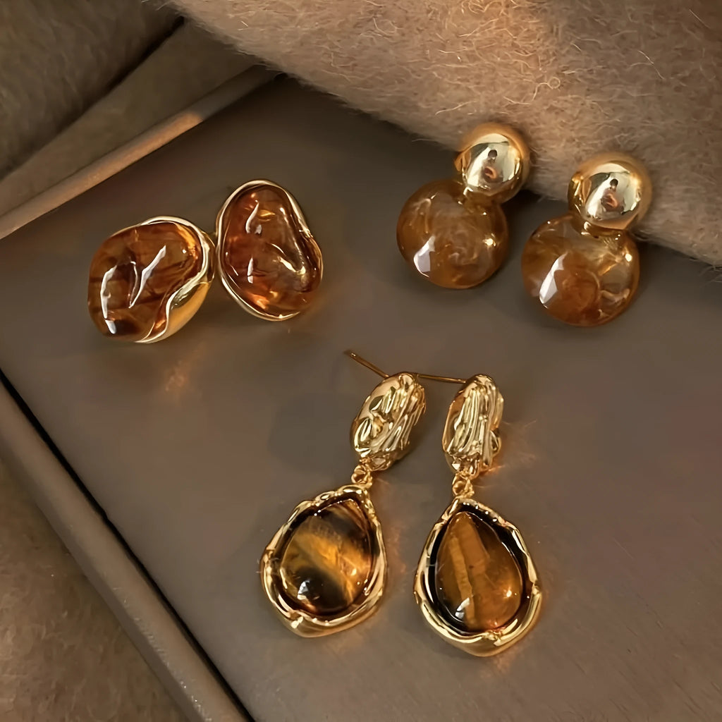 Handmade geometric alloy earrings with tassels in three styles: round, irregular, and teardrop