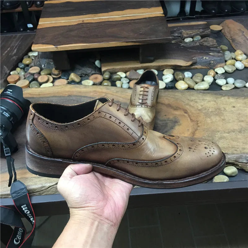 Men's light brown vintage leather shoes with engraved distressing and lace-up closure