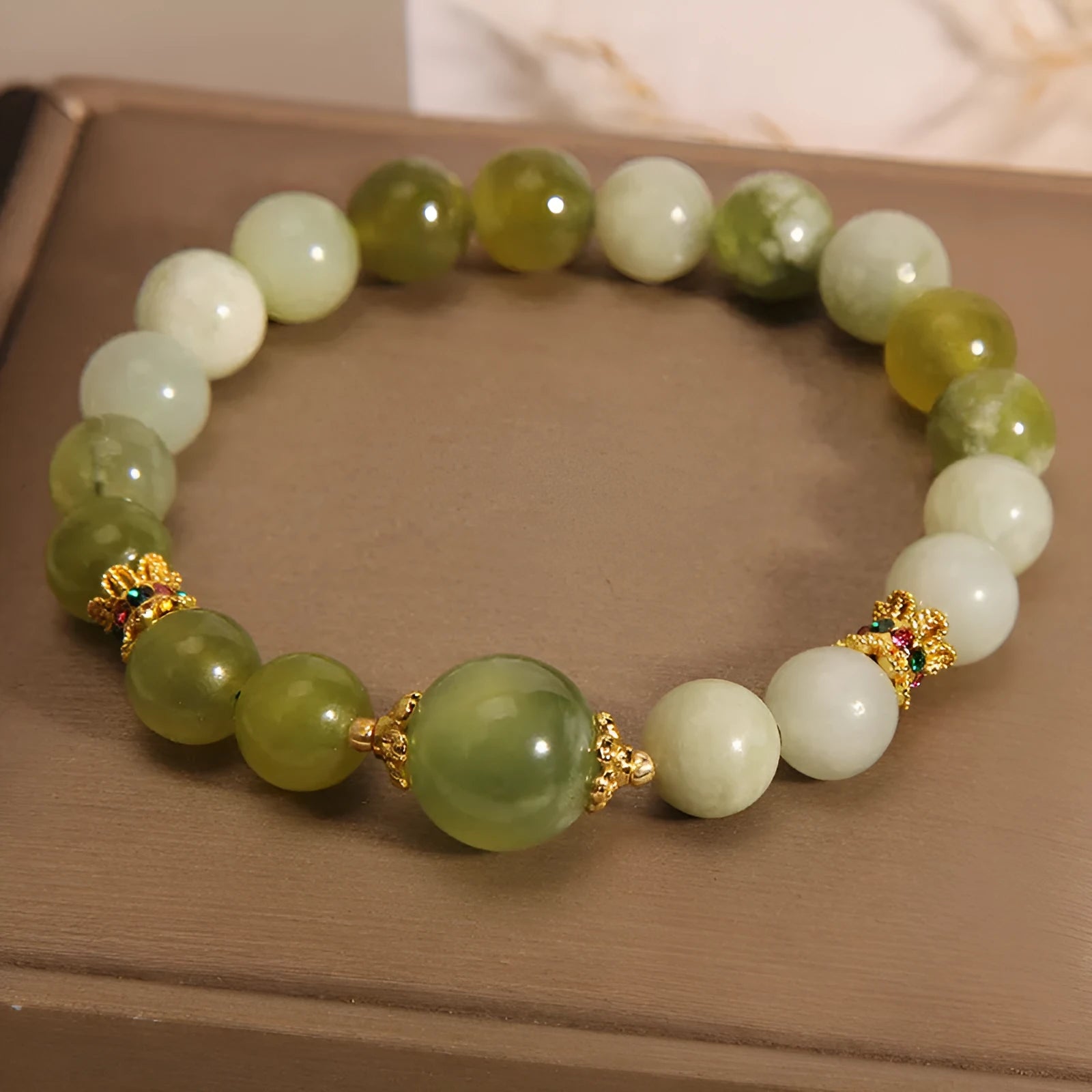 Women's bracelet made from green Xiuyan jade in a light luxury sweet Mori style.