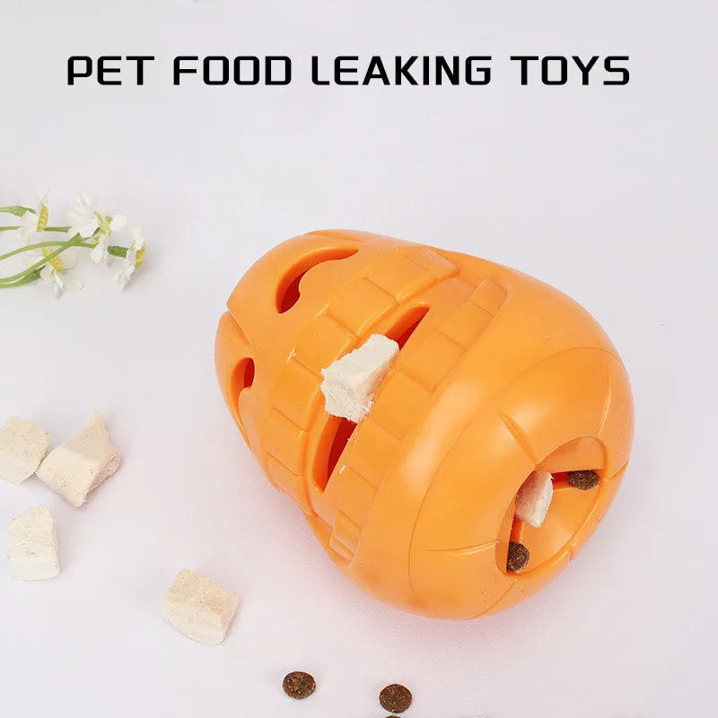 Orange Halloween pumpkin shaped dog chew toy with treat dispensing funnel opening