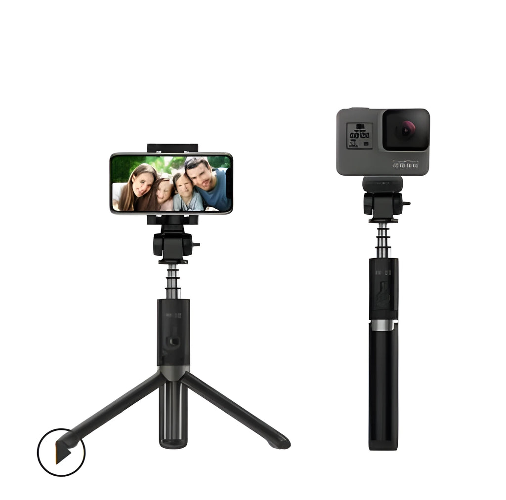 Black aluminium alloy Bluetooth selfie stick with tripod bracket extended, holding smartphone