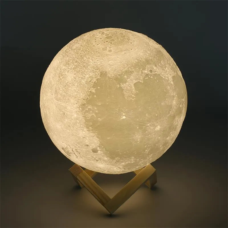 3D printed white moon lamp on a wooden stand with touch-control ring at base