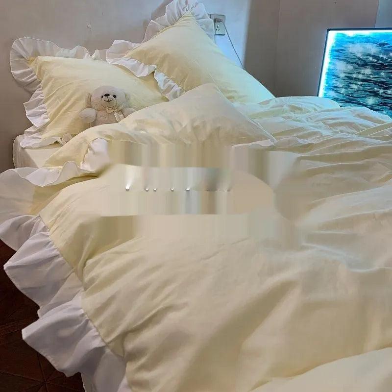 Mori style washed cotton four-piece bedding set in a solid lace-accented colour, shown on a bed.