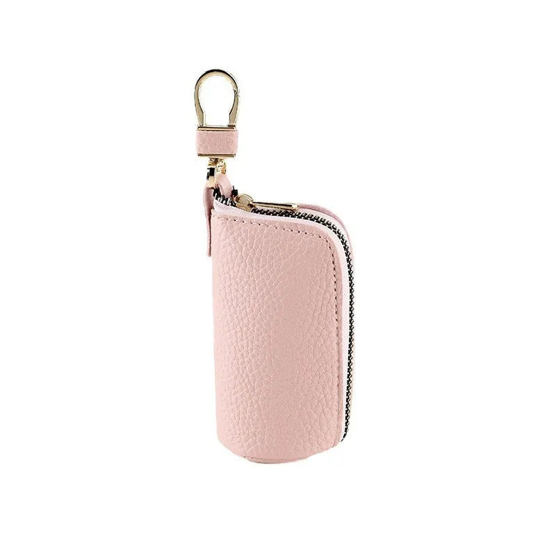 Men's black PU key case with zipper closure showing interior key organisation