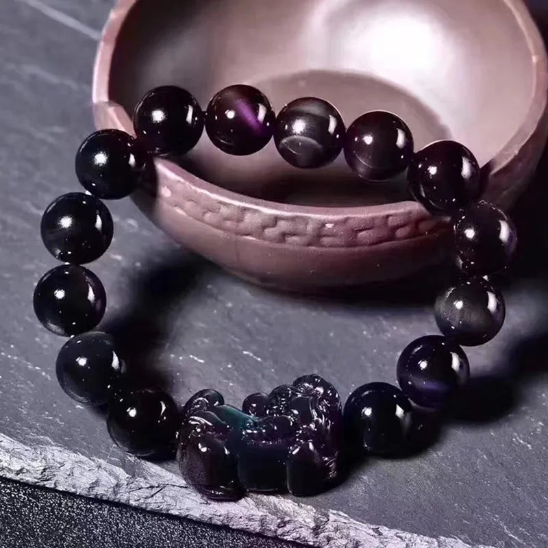 Natural ice colour eye obsidian crystal bracelet in unisex style with various bead sizes.