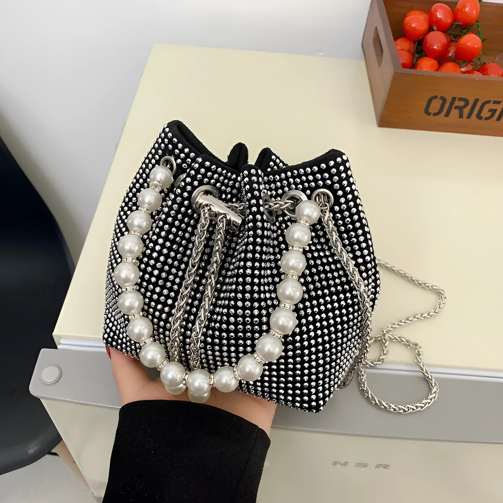 Diamond shoulder strap crossbody bucket bag in soft PU with chain detail and internal organisers