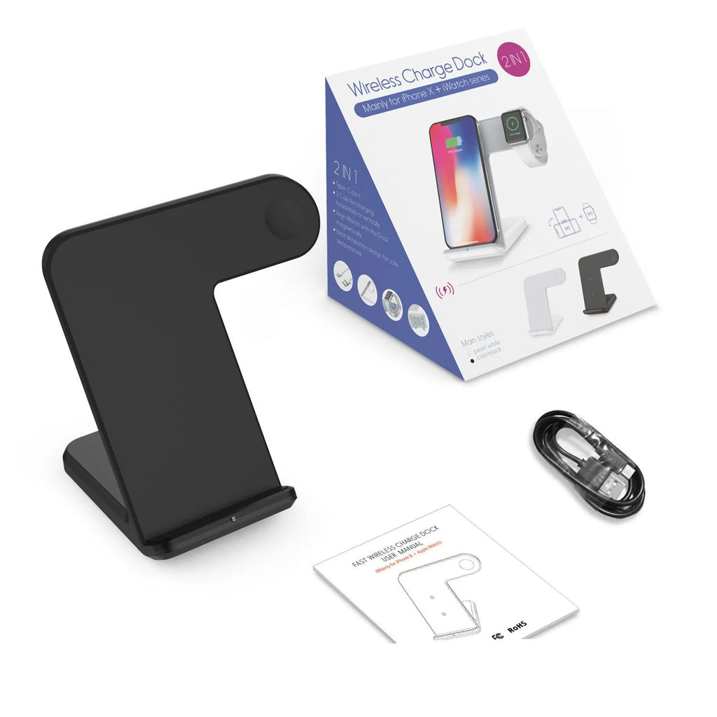 Black wireless charging pad on a wooden desk with smartphone placed on top, showing non-slip silicone base.