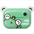 Pink instant print digital camera with 2.4-inch screen shown with printing paper and lanyard