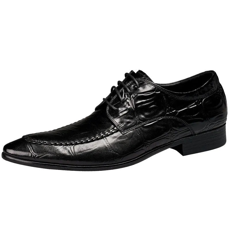 Men's black and brown leather loafers with alligator pattern and a horsebit buckle on a low rubber sole.