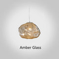 Modern fabric chandelier light with glass shade in amber, clear, or smoke grey, shown in small and large sizes.