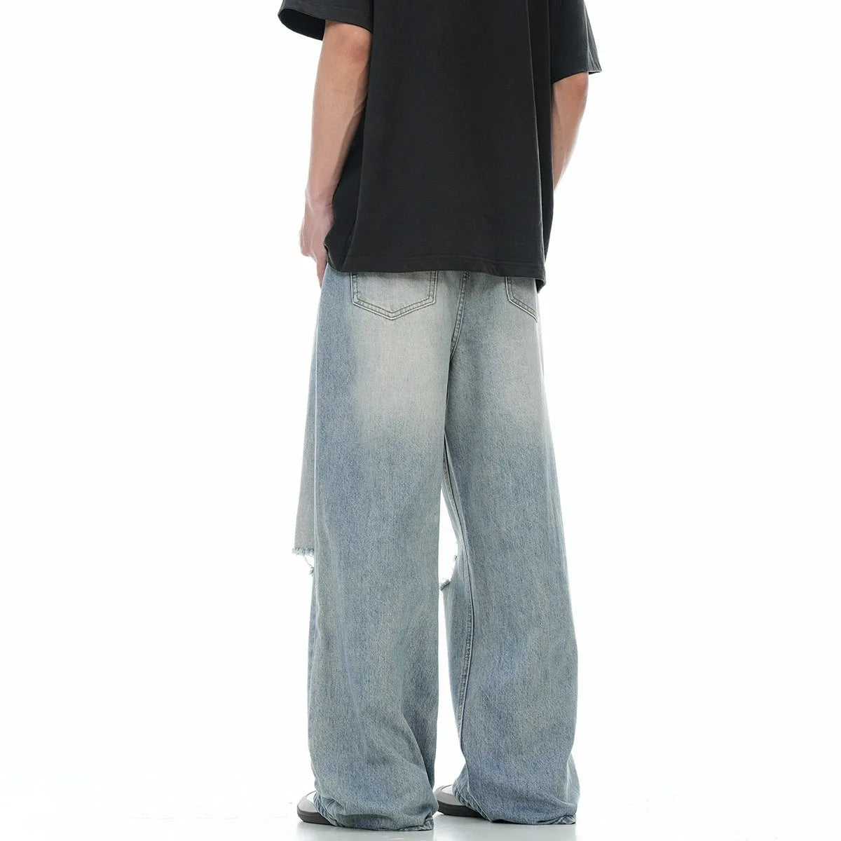 Men's blue straight-leg jeans with retro styling and zipper fly