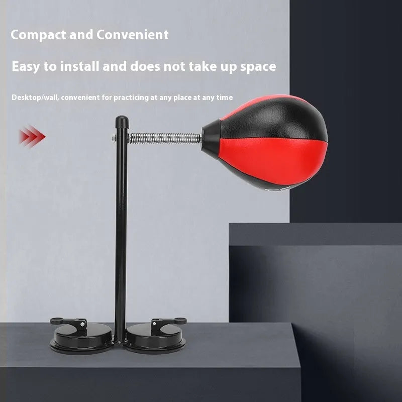 Inflatable hanging boxing reaction ball with pear-shaped tumbler vent and suction cup mounting system