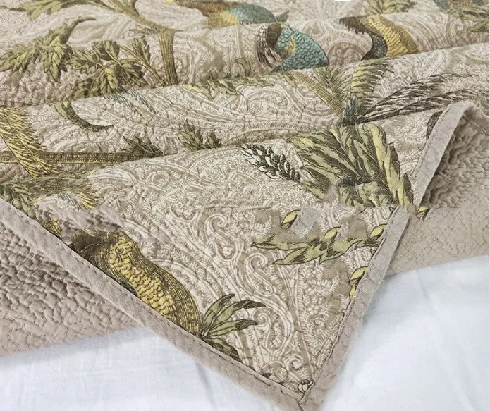 Blue American style cotton bedspread with plant and flower pattern, quilted texture