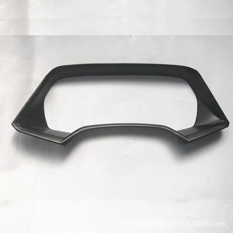 ABS plastic decorative dashboard frame for a BMW X5L in Carbon Fibre and Peach Wood finishes