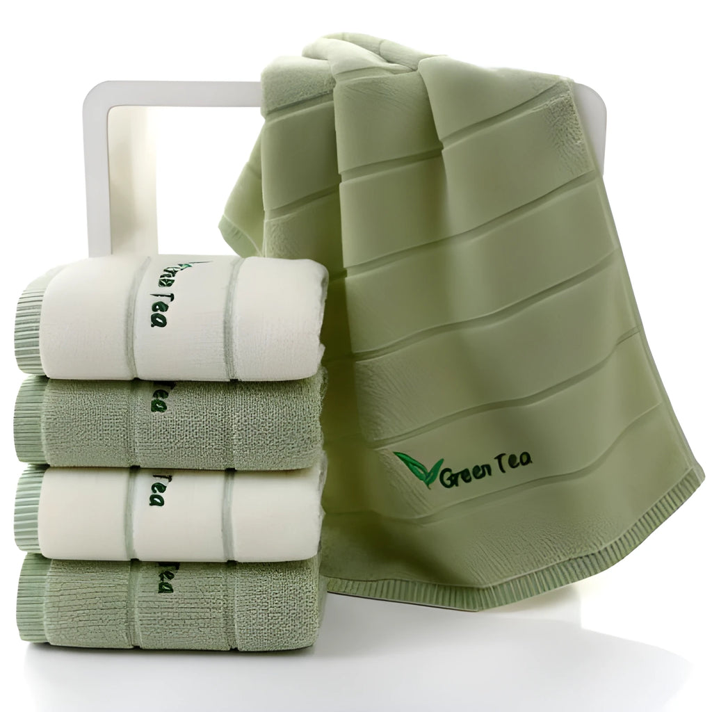 Pure cotton 32 strand embroidered face washing towel in green, 34x74 cm, on white background