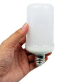 Decorative flame effect LED bulb producing flickering fake fire light