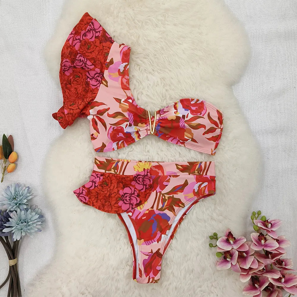 Women's pink floral print one-shoulder bikini with ruffled detail and high-waist briefs