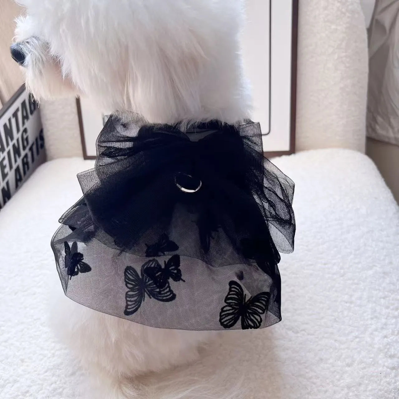 Black gauze princess tulle skirt for a small dog or cat on a white background.