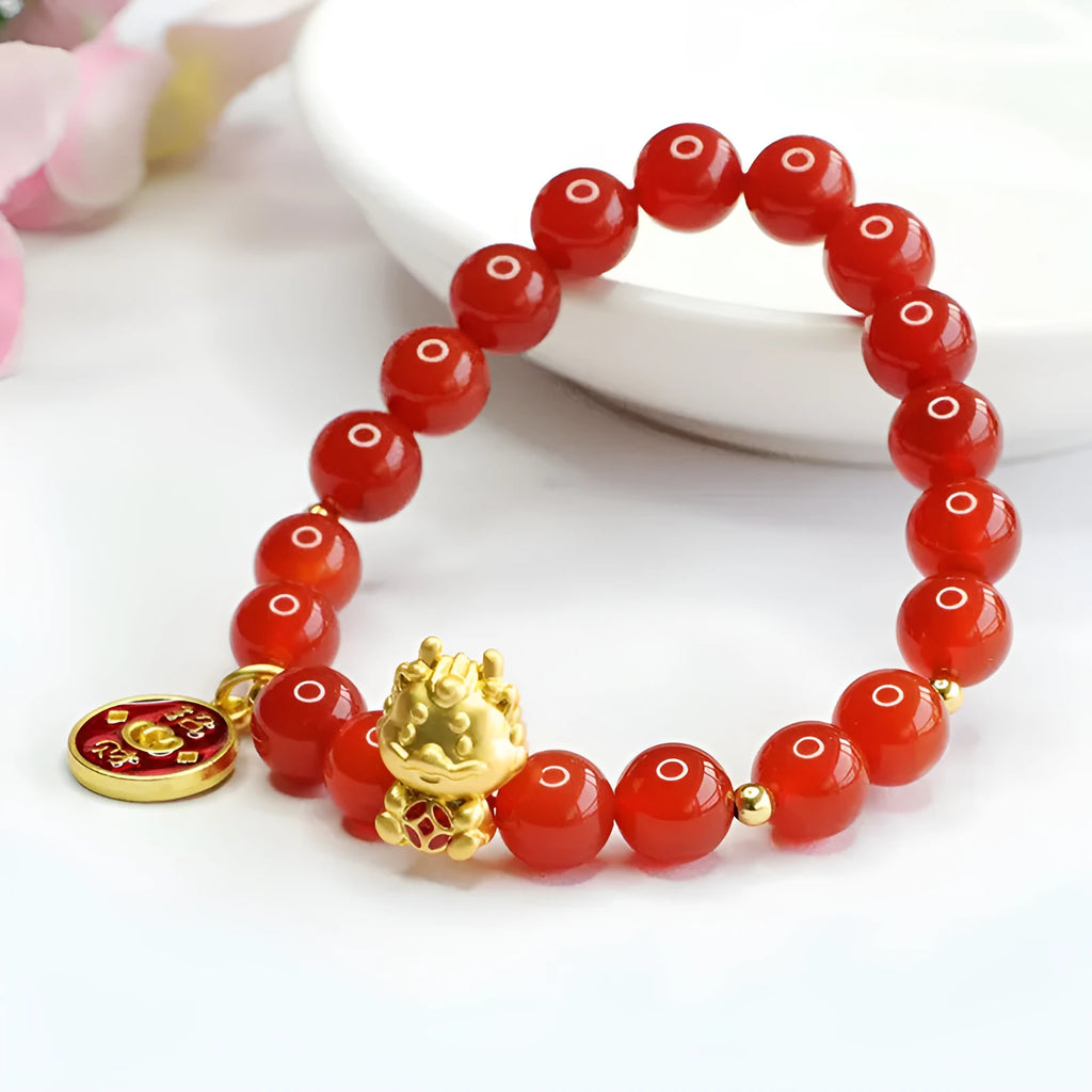 Red agate bead bracelet with Chinese style design for Dragon zodiac sign, showing 8mm bead size.