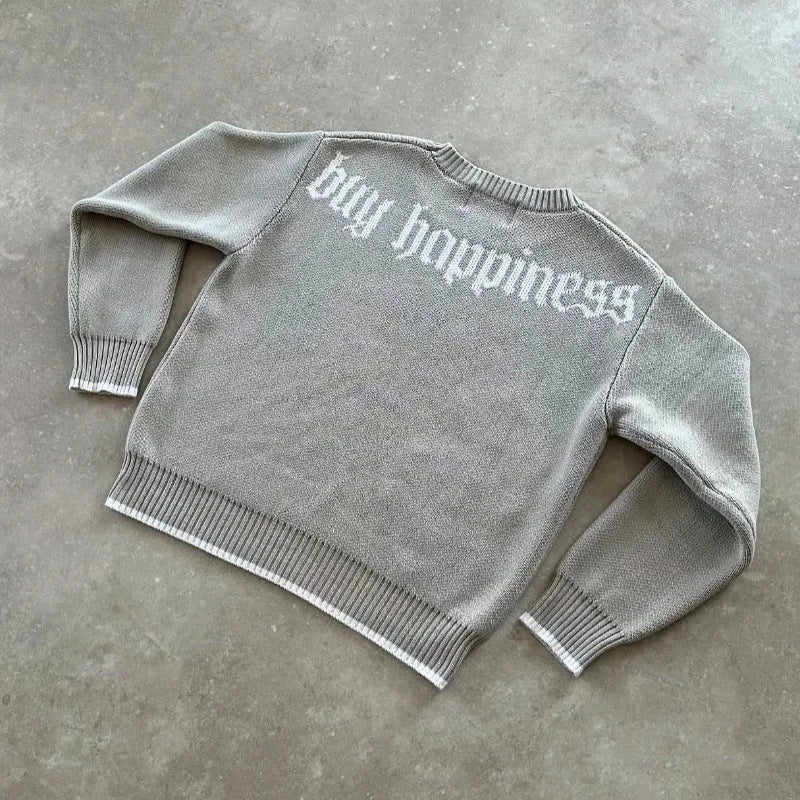 Grey loose-fitting acetate knitwear coat with jacquard pattern and long sleeves.