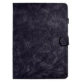Leather-look tablet protective case with integrated stand in black, shown propping up a tablet.