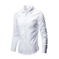 Long sleeve linen shirt in a loose fit, shown in a solid colour, with a button front and standard collar.
