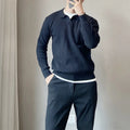 Male model wearing loose fit striped elastic knit sweater in modal and rabbit fur blend fabric