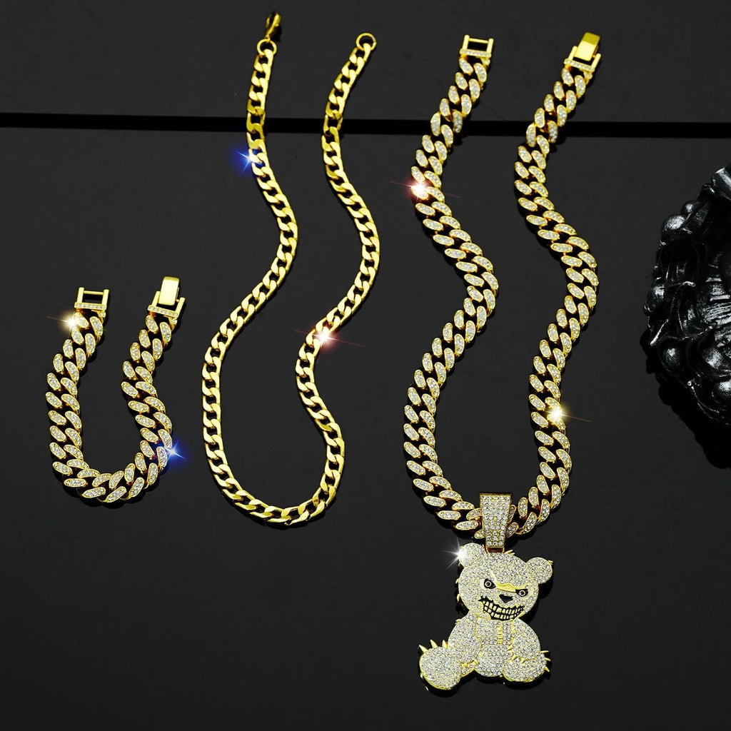 Gold three-piece jewellery set with rhinestone bear pendants on Cuban link chain necklaces and bracelet