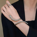 Gold twisted snake ring and bracelet set with exaggerated winding design