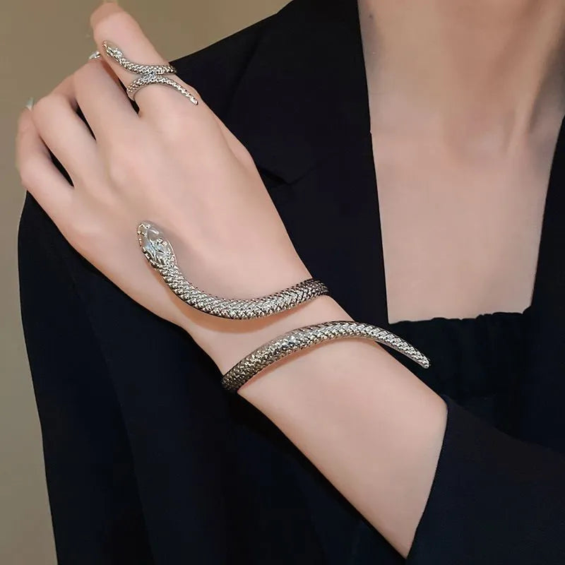 Gold twisted snake ring and bracelet set with exaggerated winding design